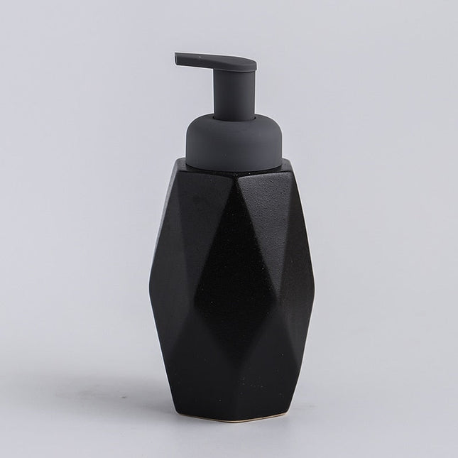 Dispenser sapone design geometrico in ceramica.