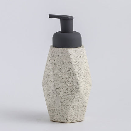 Dispenser sapone design geometrico in ceramica.