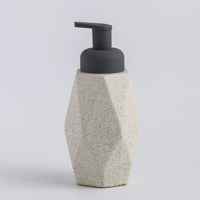 Dispenser sapone design geometrico in ceramica.