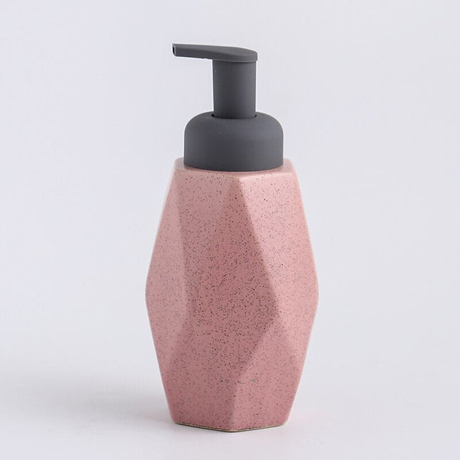 Dispenser sapone design geometrico in ceramica.