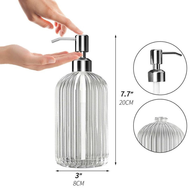 Dispenser sapone in vetro rigato trasparente.