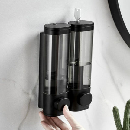 Dispenser sapone da parete trasparente.