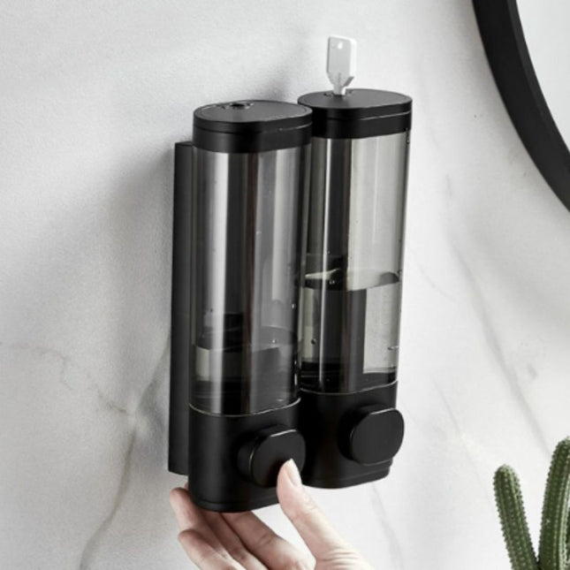 Dispenser sapone da parete trasparente.