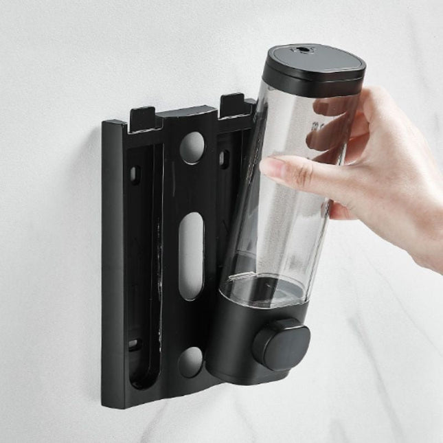 Dispenser sapone da parete trasparente.