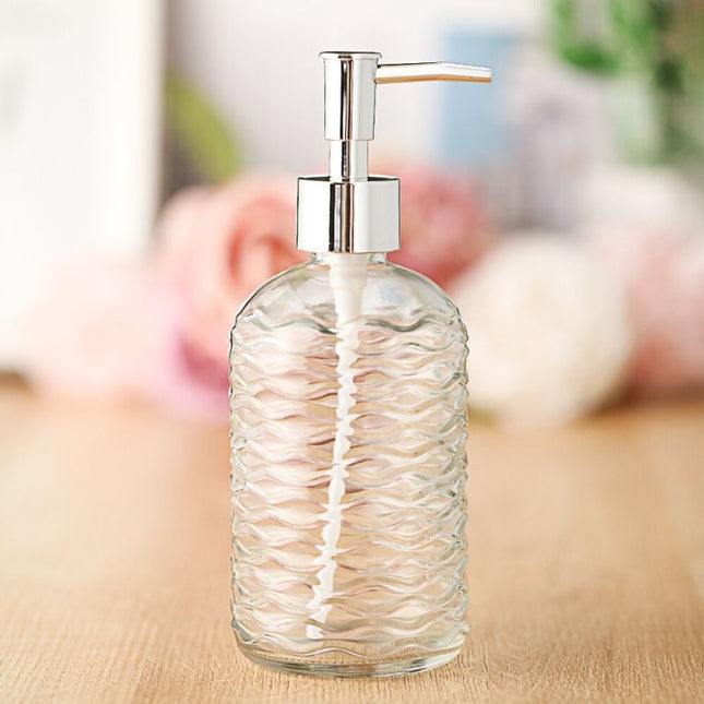 Dispenser sapone in vetro design ondulato.