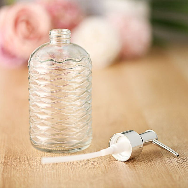 Dispenser sapone in vetro design ondulato.