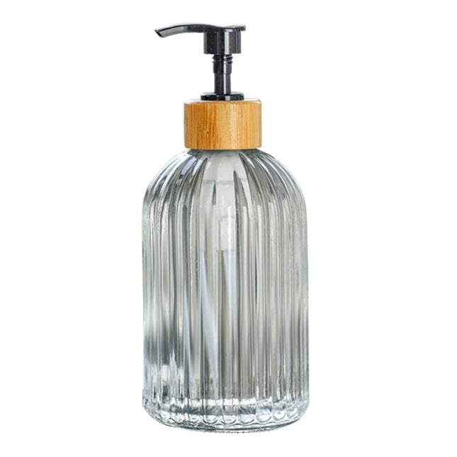 Dispenser sapone nero con dettagli legno.