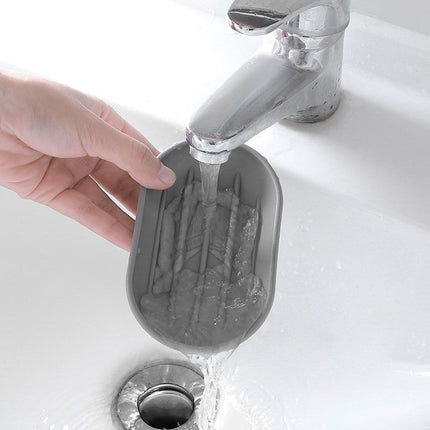 Portasapone in plastica riciclabile per bagno.