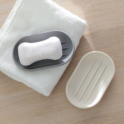 Portasapone in plastica riciclabile per bagno.