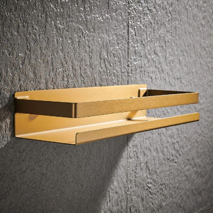 Mensola doccia di design colore oro.