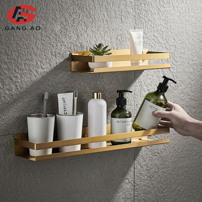 Mensola doccia di design colore oro.